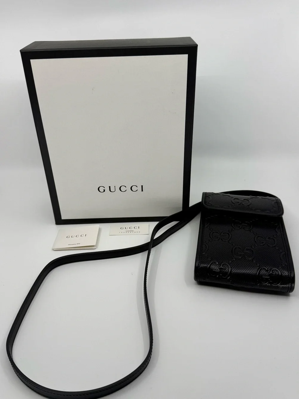 Gucci Black Embossed GG Leather Phone Bag